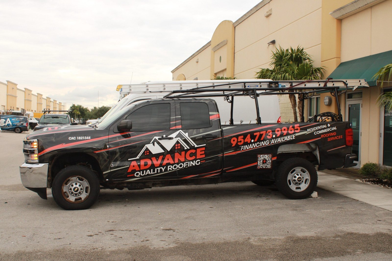 Advance Quality Roofing branded work truck in South Florida